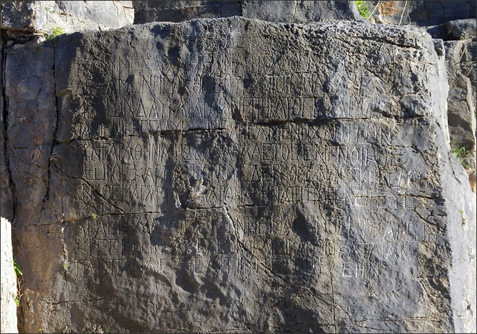 Ancient votive inscriptions beside the path to the acropolis, Lindos